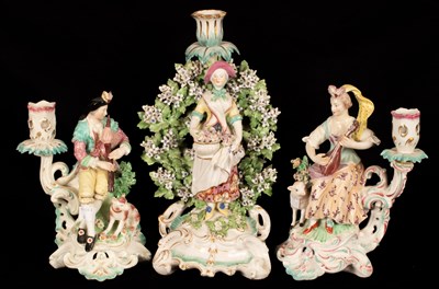 Lot 224 - A matched pair of Derby figural single branch...