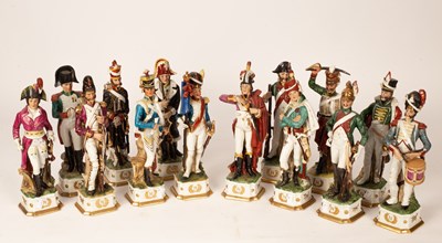 Lot 234 - Fourteen figures of Napoleonic soldiers, gilt...