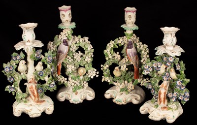 Lot 238 - Four Derby style animal candlesticks modelled...