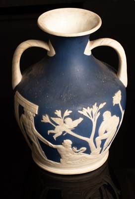 Lot 250 - A dark blue jasperware copy of the Portland...