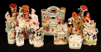 Lot 251 - A collection of Staffordshire porcelain spill...