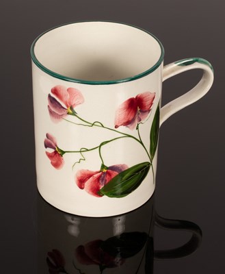 Lot 282 - A Wemyss ware mug, Sweet Pea pattern, 15cm