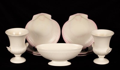 Lot 283 - A garniture of three Wedgwood white vases,...