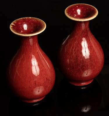 Lot 306 - A pair of flambé glazed bottle vases, Yuhuchun,...