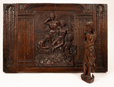 Lot 319 - A carved oak panel with allegorical figures in...