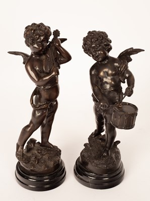 Lot 320 - After Moreau/Musical Cherubs/a pair/bronzes,...