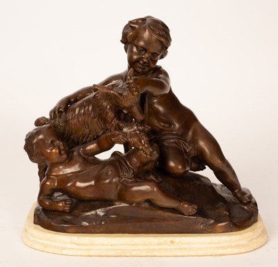 Lot 323 - A figure of putti with a goat, bronze, 27cm high