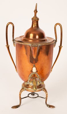 Lot 344 - A twin handled copper and brass urn with...