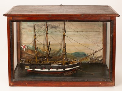 Lot 351 - A wooden model of a three-master ship in a...