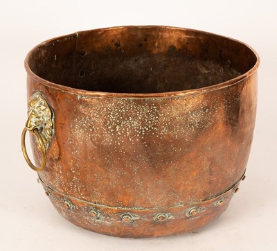 Lot 354 - A copper cauldron with lion mask handles, 48cm...