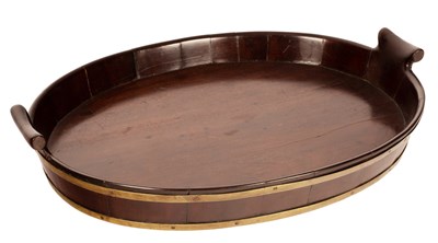 Lot 378 - A George III mahogany brass bound oval tray,...