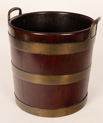 Lot 379 - A George III mahogany brass bound peat bucket,...