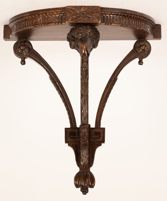 Lot 380 - A Neoclassical carved wooden wall bracket with...