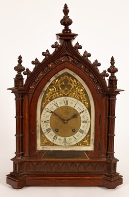 Lot 438 - A Victorian oak cased mantel clock of Gothic...