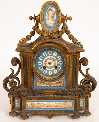 Lot 443 - A gilt metal and porcelain mantel clock,...