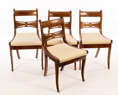 Lot 604 - Four Regency mahogany single chairs, with...