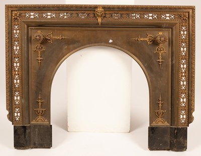 Lot 608 - A 20th Century brass fire surround, decorated...