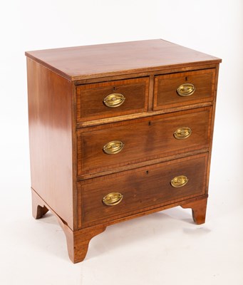 Lot 610 - A small Georgian mahogany chest of two long...