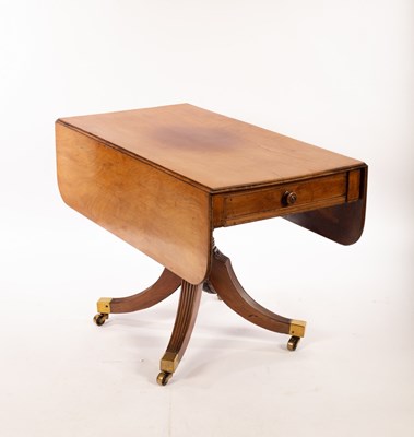 Lot 611 - A late Regency mahogany two-flap table, fitted...