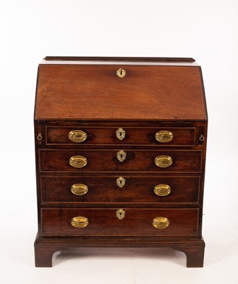 Lot 612 - A George III mahogany bureau, fitted interior...