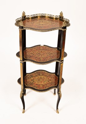 Lot 618 - An étagère of Boulle design inlaid brass and...