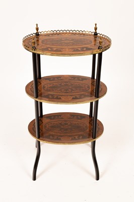 Lot 619 - A walnut and marquetry three-tier étagère with...