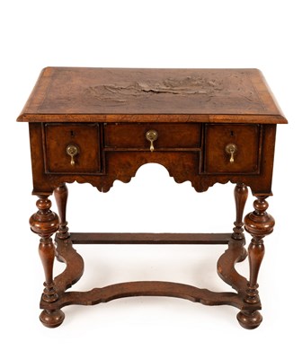 Lot 625 - A William and Mary style walnut table, fitted...