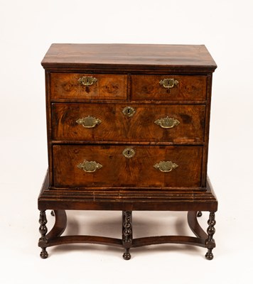 Lot 631 - A George I walnut chest of two long and two...