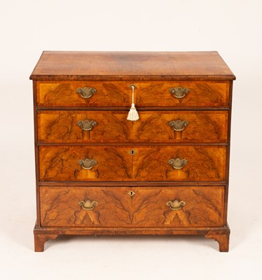 Lot 633 - A George II walnut chest of four drawers, 94cm...