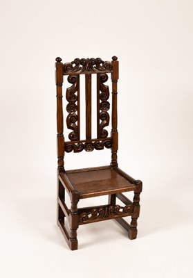 Lot 646 - An oak single chair with twin carved splat to...