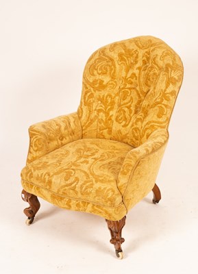 Lot 648 - A Victorian upholstered armchair on cabriole legs