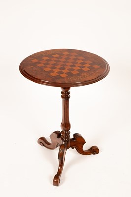 Lot 650 - A Victorian walnut table the top inlaid for...