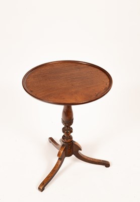 Lot 654 - A 19th Century mahogany table on tripod...