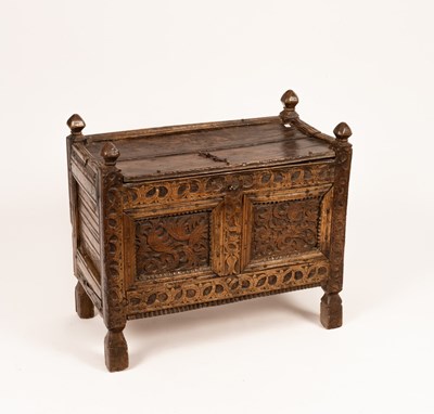 Lot 657 - A Scandinavian carved oak chest with panelled...