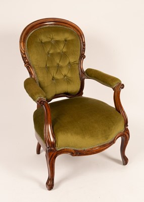 Lot 672 - A Victorian walnut open armchair on cabriole legs