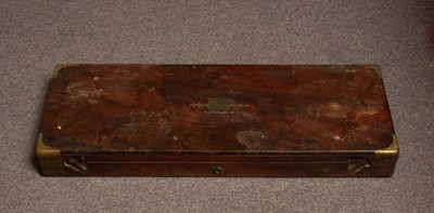 Lot 674 - A brass bound mahogany gun case with a fitted...