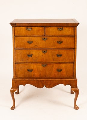 Lot 675 - A walnut chest on stand, Queen Anne and later...