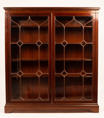 Lot 684 - A mahogany bookcase on bracket feet, 132cm wide