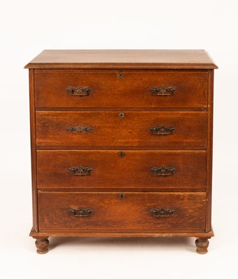 Lot 685 - A Victorian oak chest of four long drawers on...