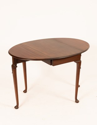 Lot 688 - A mahogany two-flap table on round taper legs...