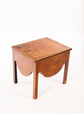 Lot 699 - A mahogany table, converted from a commode,...