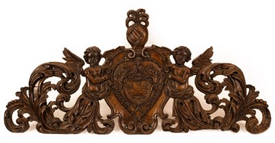 Lot 701 - A late 17th Century Italian carved cedar coat...