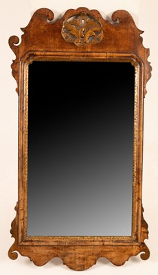 Lot 715 - A George II walnut and parcel gilt wall mirror,...