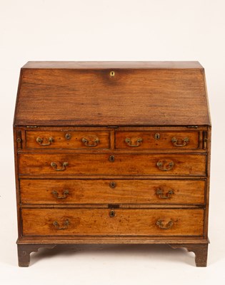 Lot 743 - A George III mahogany bureau, circa 1780, with...