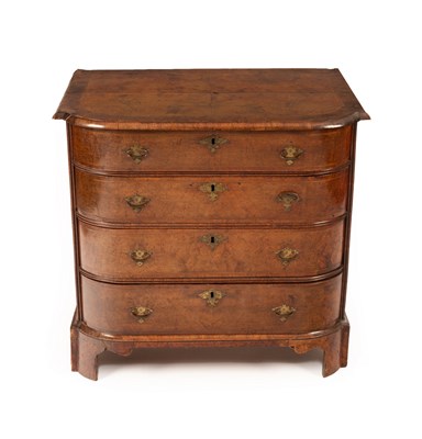 Lot 749 - A George II walnut bowfronted chest of drawers,...