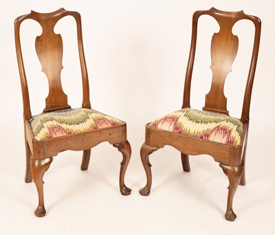 Lot 750 - A pair of George I walnut dining chairs, circa...