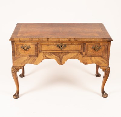 Lot 753 - A George I style walnut dressing table, the...