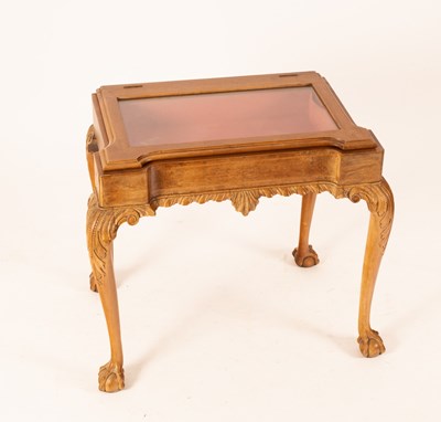 Lot 762 - A George II style display table, the glass...