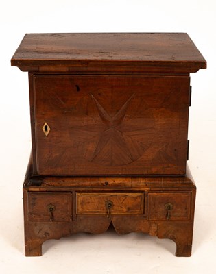 Lot 775 - A miniature walnut cabinet on stand, Queen...