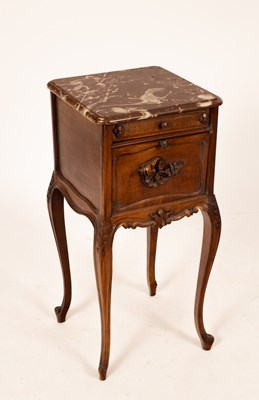 Lot 783 - A French provincial bedside table with marble...